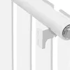 A close-up view of a white radiator bracket and part of the radiator. Náhled obrázku produktu