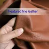 A hand is shown touching a piece of brown leather, with text overlayed on the image. Anteprima dell’immagine prodotto