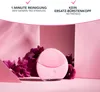 A pink facial cleansing device is placed among pink flowers and pink geometric shapes, with text overlays highlighting product features. Produktbild-Vorschau