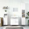 A clean, modern bathroom vanity set with a sink, cabinets, and storage towers against a tiled wall. Produktbild-Vorschau