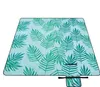 A light blue picnic blanket with a green tropical fern pattern, folded and displayed against a white background. Produktbild-Vorschau