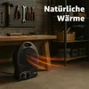 A black electric heater is shown in a workshop setting, with tools on a pegboard and shelves in the background. Orange heat waves emanate from the heater. Produktbild-Vorschau