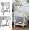 A collage of images showing a white nightstand with a drawer and a shelf, displayed from different angles and in a lifestyle setting. Voir les images du produit