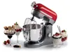 A red and silver stand mixer is displayed with several dessert parfaits arranged in front of it. Podgląd zdjęcia produktu
