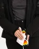 A person is cleaning ski goggles with a cloth. Produktbild-Vorschau