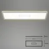 A white, rectangular LED ceiling light with a silver trim is shown against a plain gray background. Below the light, there are technical drawings indicating its dimensions. Produktbild-Vorschau