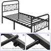 Close-up views of a black metal bed frame assembly, showing how to connect parts. Produktbild-Vorschau
