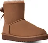 A single brown Ugg boot with a bow on the back, shown from the side against a white background. Anteprima dell’immagine prodotto