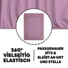 A close-up of a pink fitted sheet with text overlays highlighting its features. Produktbild-Vorschau