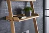 A close-up view of a wooden ladder shelf against a dark brick wall, showing a book and a potted plant on one of the shelves. Voir les images du produit
