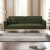 A green sofa bed with gold legs is shown in a living room setting. Anteprima dell’immagine prodotto