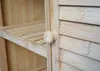 Close-up view of a wooden cabinet door and shelves. Podgląd zdjęcia produktu