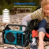 A person is sitting outdoors with a radio. Produktbild-Vorschau