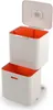 A stacked two-tier trash and recycling bin with orange interiors and a white exterior. Podgląd zdjęcia produktu