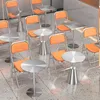 A cafe or restaurant setting with multiple tables and chairs. Produktbild-Vorschau