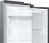 Close-up interior view of a refrigerator's ice maker and dispenser. Produktbild-Vorschau