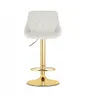 A beige upholstered bar stool with a gold base and stem, shown against a white background. Produktbild-Vorschau