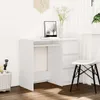 A white desk with drawers and an open shelf, next to a white chair, in a well-lit room with sheer curtains. Anteprima dell’immagine prodotto
