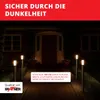 A dark outdoor scene at night, with pathway lights illuminating a walkway leading to a house entrance. Produktbild-Vorschau