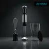 A hand blender set with accessories is displayed against a dark, textured background. Produktbild-Vorschau