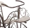 A close-up view of a decorative metal and wood bicycle-shaped plant stand. Produktbild-Vorschau