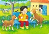 A young girl is sitting on a blue bench in a farmyard, playing with two goats. A horse and birds are also visible in the background, along with a barn. Anteprima dell’immagine prodotto