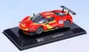 A die-cast model of a red and yellow Ferrari 296 GT3 race car is displayed on a black stand. Produktbild-Vorschau