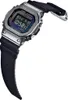 A digital watch with a metallic case and a black strap, displayed against a white background. Produktbild-Vorschau