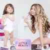 A mother and daughter are playing with makeup. Produktbild-Vorschau