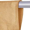 Close-up of a gold-colored fabric hanging from a silver rod. Podgląd zdjęcia produktu