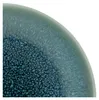A close-up view of the textured glaze on a ceramic dish. Náhľad obrázku produktu