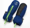 A pair of blue children's mittens with green accents and a troll logo. Produktbild-Vorschau