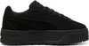 A black Puma sneaker with a thick platform sole is shown from the side against a white background. Produktbild-Vorschau