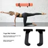 A woman is doing yoga in front of a wall with a yoga mat holder mounted on it. Below are images of the yoga mat holders. Podgląd zdjęcia produktu