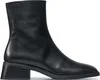 A black leather boot on a white background. Produktbild-Vorschau
