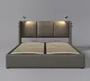 A studio shot of a modern bed frame with a padded headboard and integrated reading lights. Anteprima dell’immagine prodotto