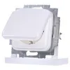 A white electrical outlet with a flip-up cover, mounted on a gray metal frame. Náhled obrázku produktu