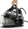 A hand is holding the handle of a black and silver steam iron station. Produktbild-Vorschau