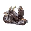 Skeletts, das auf einem Motorrad sitzt.  Trägt eine braune Kutte und eine goldene Kette. Produktbild-Vorschau