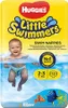 A baby wearing swim nappies is shown in water, with cartoon characters from Finding Dory at the bottom. Anteprima dell’immagine prodotto