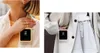 Two lifestyle shots of a person wearing a Samsung Galaxy Flip5 phone case with a ring attached to their clothing. Anteprima dell’immagine prodotto