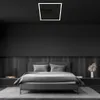 A modern bedroom with a dark theme, featuring a bed and a ceiling light. Produktbild-Vorschau