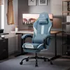 A gaming chair is set up in a home office environment with a desk and monitor. Produktbild-Vorschau
