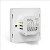 The back of a white thermostat is shown, with connection terminals and labels visible. Podgląd zdjęcia produktu