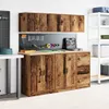 A garage or workshop setting with a wooden cabinet and shelving unit. Podgląd zdjęcia produktu