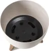 A close-up view of a beige planter pot with a black insert and brown legs, set against a white background. Produktbild-Vorschau