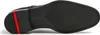 The underside of a black shoe is shown against a white background. Produktbild-Vorschau