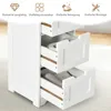 A white bathroom cabinet with three drawers partially open, showing the interior and contents. Text overlays describe product features. Náhled obrázku produktu