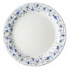 A white plate with a blue floral pattern around the rim. Produktbild-Vorschau