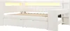 A white sofa bed with integrated drawers and a desk attachment. Produktbild-Vorschau